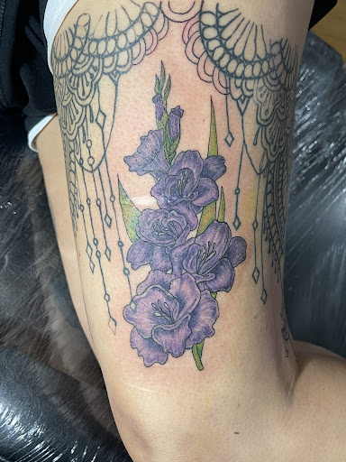 Explore emperor's new groove tattoo ideas, creative tattoo ideas in Plattsburgh, available at Ink by Lace LLC