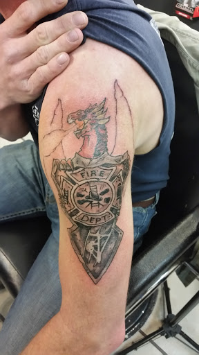 Explore king of the hill tattoo ideas, creative tattoo ideas in Quincy, available at Threshold Of Pain Tattoo Shop