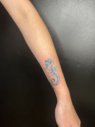 Explore spiral tattoo ideas, creative tattoo ideas in Foley, available at Emerald Ink Tattoos by Victoria