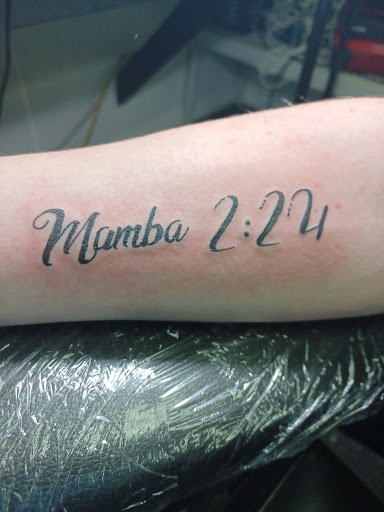 Explore rose vine tattoo ideas, creative tattoo ideas in Owosso, available at Twisted ink tattoo