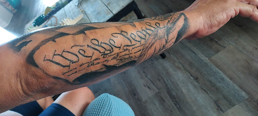 Explore name tattoo ideas on chest, creative tattoo ideas in Lakeland, available at Holy Grail Tattoo