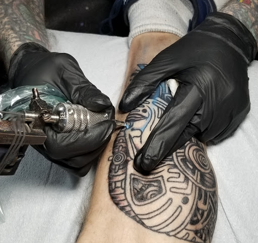 Explore first child tattoo ideas for dad, creative tattoo ideas in Ann Arbor, available at Spiral Tattoo