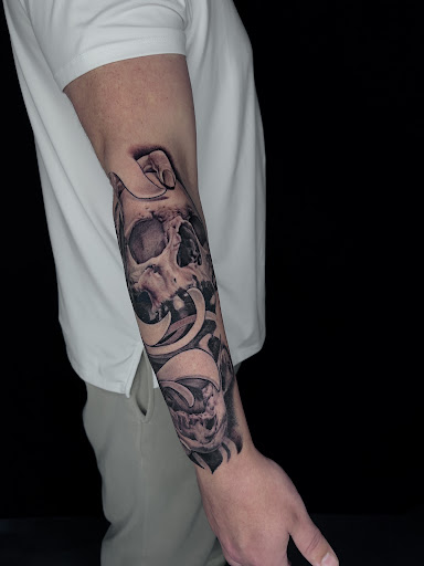 Explore banksy tattoo ideas, creative tattoo ideas in West Palm Beach, available at Wooden Heart Tattoos and Piercings