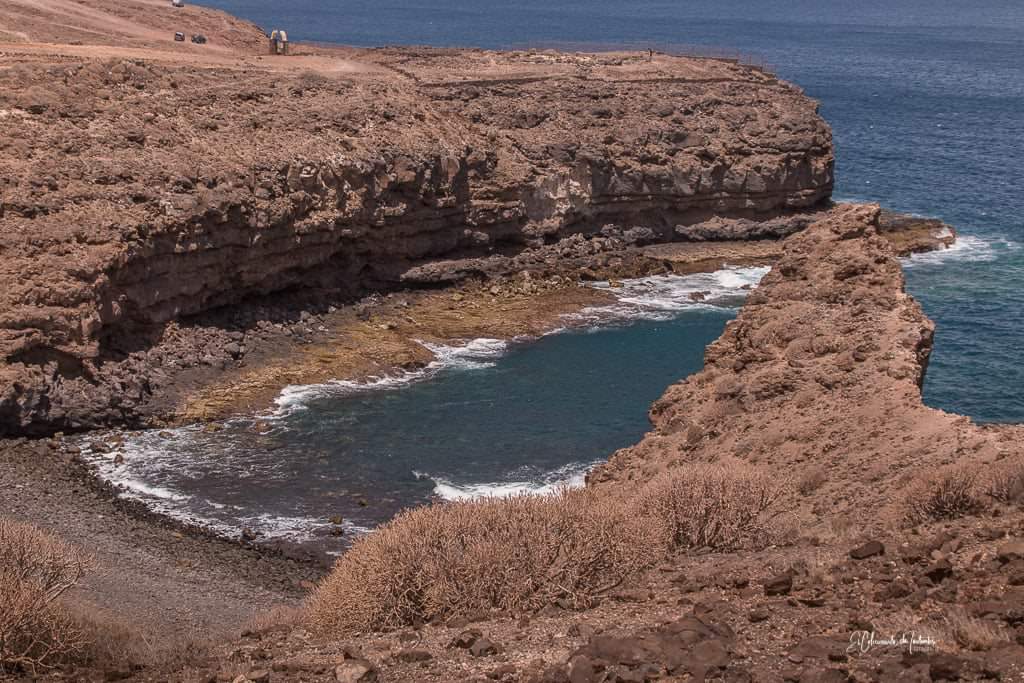 Photo de Playa del Lagarto avec l'eau cristalline de surface