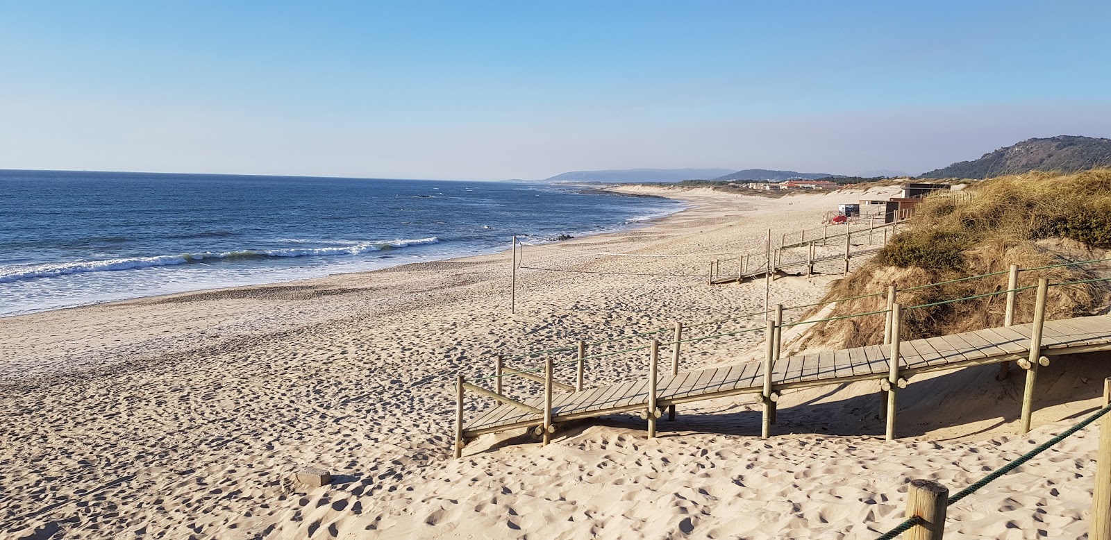 Fotografija Praia de Suave Mar z svetel pesek površino