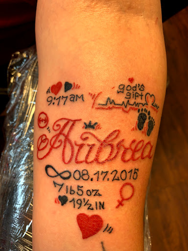 Explore tattoo ideas for upper arm, creative tattoo ideas in Seymour, available at American Gypsy Tattoo Corp.