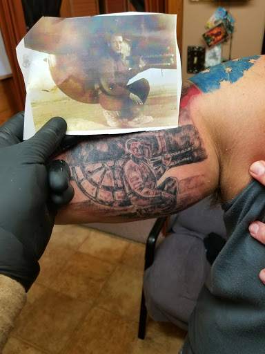 Explore men's back tattoos ideas, creative tattoo ideas in Conway, available at Primal Urge Tattoos