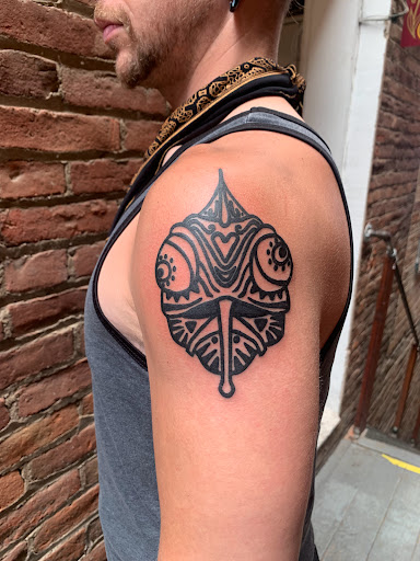 Explore tattoo ideas for arms and shoulders, creative tattoo ideas in Golden, available at Allegoric Art