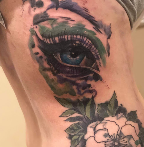 Explore black cover up tattoo ideas, creative tattoo ideas in Sullivan, available at Double Time Tattoo