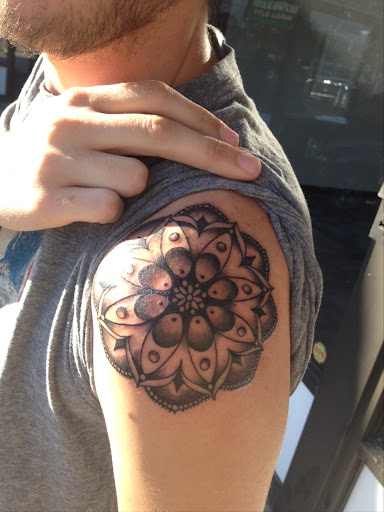 Explore flower vine tattoo ideas, creative tattoo ideas in Chattanooga, available at American Ink