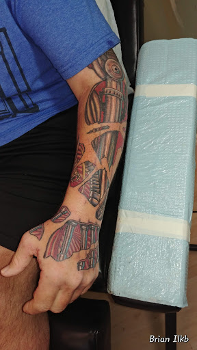 Explore halloween sleeve tattoo ideas, creative tattoo ideas in North Palm Beach, available at Triton Tattoo North Palm Beach