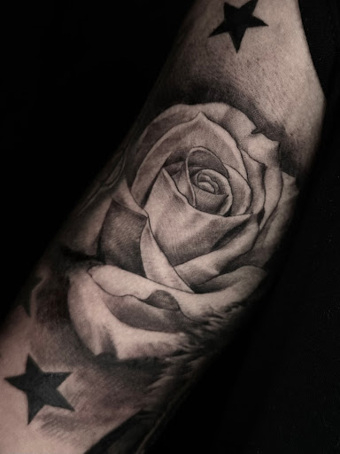 Explore motherhood tattoo ideas, creative tattoo ideas in Norcross, available at Brotherhood Tattoo