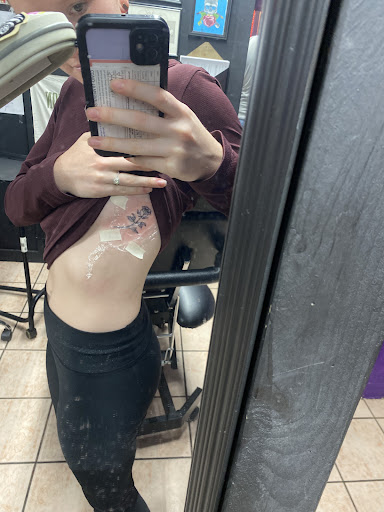Explore men's neck tattoo ideas, creative tattoo ideas in Denison, available at Mad House Tattoos