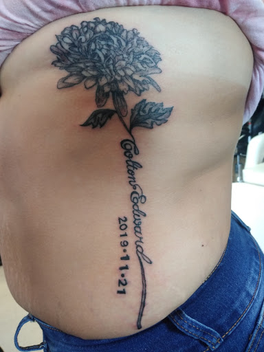 Explore angel neck tattoo ideas, creative tattoo ideas in Largo, available at Inside Ink Tattoo Studio