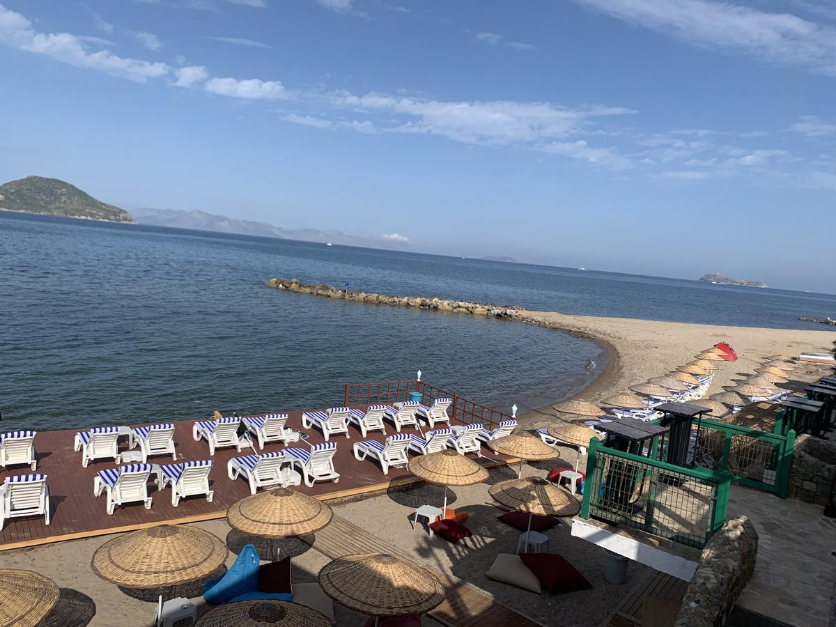 Fotografie cu Ayvan beach III cu o suprafață de apă pură albastră