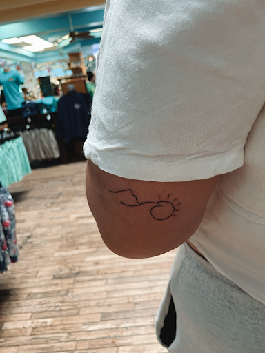 Explore dark tattoo ideas for men, creative tattoo ideas in Cocoa Beach, available at The Corner Tattoo and Piercing Studio