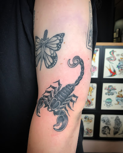 Explore dad and son tattoo ideas, creative tattoo ideas in Libertyville, available at Lucky Seven Tattoo
