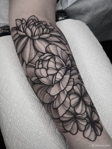 Explore simple dog tattoo ideas, creative tattoo ideas in Strasburg, available at Black Orchid Tattoo