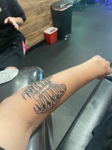 Explore cheshire cat tattoo ideas, creative tattoo ideas in Spokane, available at Fortunata Tattoo Studio