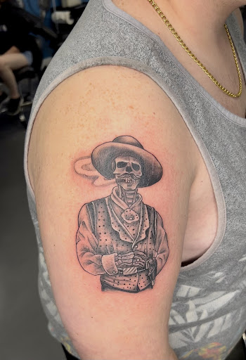 Find cute tattoo ideas for black females for your next unique tattoo in Meridian at Creative Pain Tattoo Studio