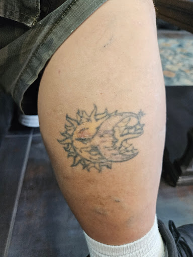 Explore black heart heart tattoo cover up ideas, creative tattoo ideas in Foley, available at Symbolic Ink Tattoo Studio