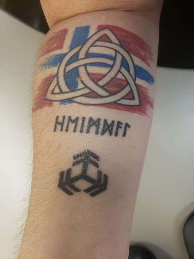 Explore tattoo ideas for your dog, creative tattoo ideas in Peoria, available at Iron Key Tattoo Studio Inc.