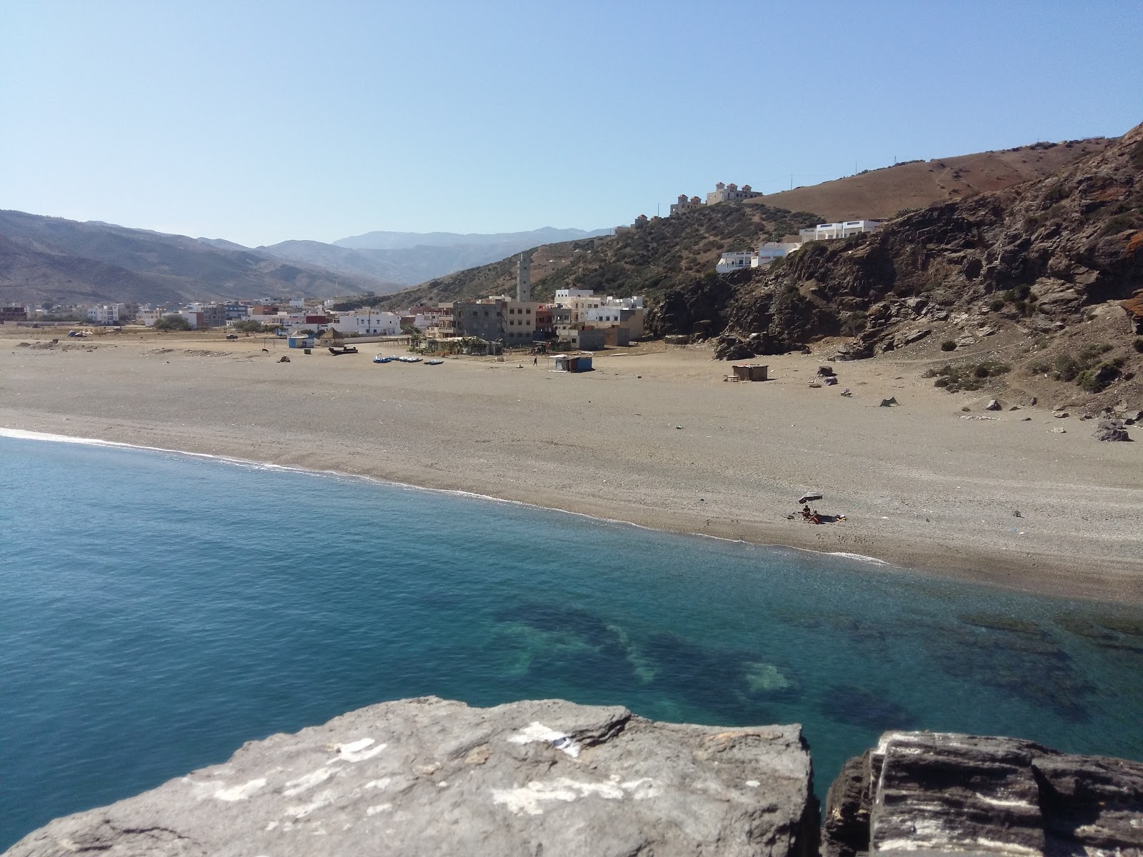 Foto av Plage Targha med lång rak strand