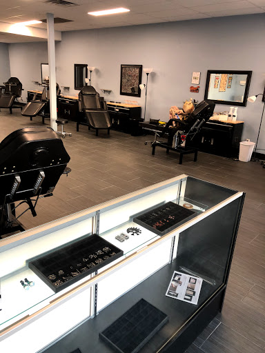 Explore mother son tattoo ideas, creative tattoo ideas in Palm Harbor, available at Angry Owl Tattoo and Piercing