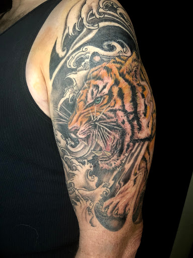 Explore tattoo ideas for leg sleeve, creative tattoo ideas in Ventura, available at White Lotus Body Arts Studio