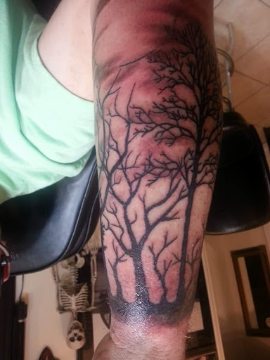 Explore womb tattoo ideas, creative tattoo ideas in Brunswick, available at Street Life Tattoos