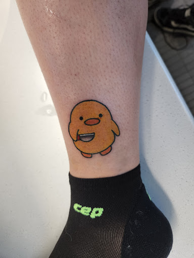 Explore marriage ring tattoo ideas, creative tattoo ideas in Reno, available at South Town Tattoo Collective