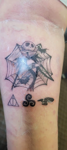 Explore the beatles tattoo ideas, creative tattoo ideas in Angola, available at Hoodlum Ink