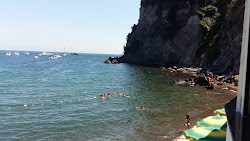 Foto von Spiaggia di Cartaromana und die siedlung