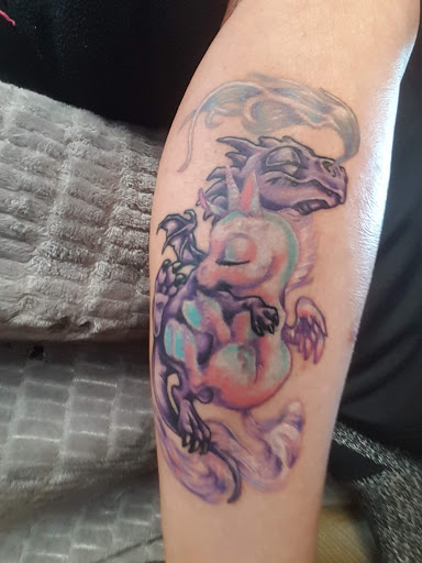 Explore bad omens tattoo ideas, creative tattoo ideas in Tifton, available at Embody Art Tattoo Studio