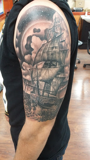 Explore map tattoo ideas, creative tattoo ideas in Pikeville, available at Small Town Tattoo