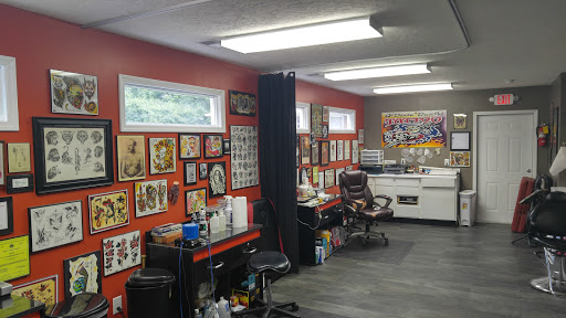 Find tattoo business card ideas for your next unique tattoo in Gadsden at Sacred Art Tattoo Company