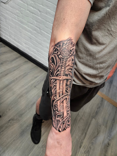 Explore side tattoo ideas for guys, creative tattoo ideas in Cumberland, available at Queen City Ink