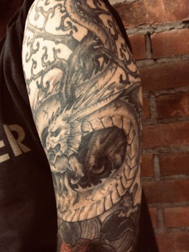 Tattoo Shop «Village Tattoo», reviews and photos, 110 W St Clair St, Romeo, MI 48065, USA