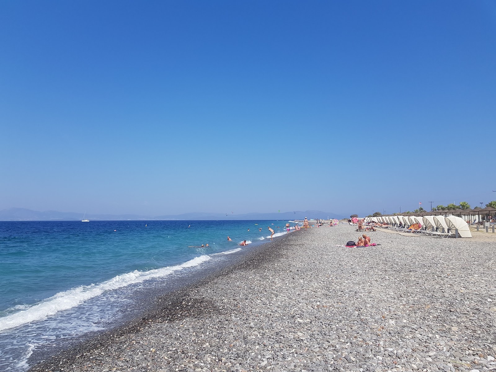 Foto van Psalidi Strand met turquoise puur water oppervlakte