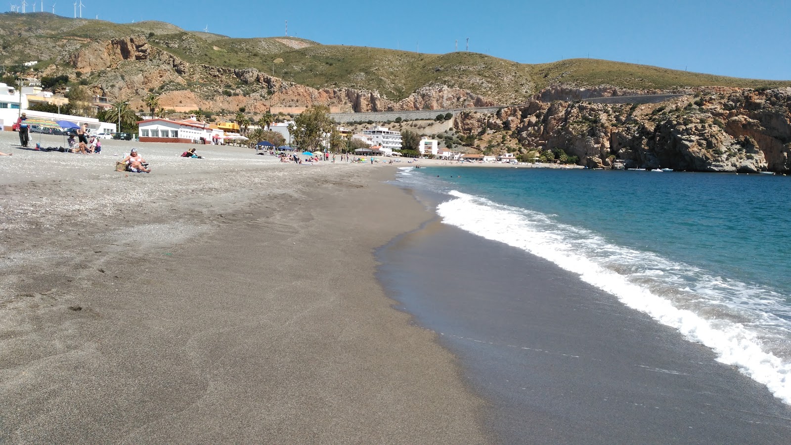 Foto av Guainos beach med lätt fin sten yta