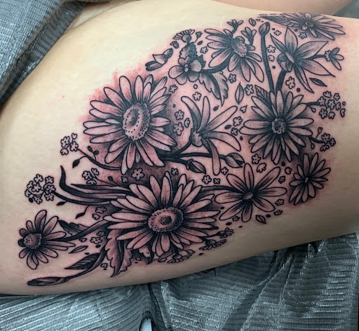 Explore elephant thigh tattoo ideas, creative tattoo ideas in Fargo, available at Golden Dragon Tattoo