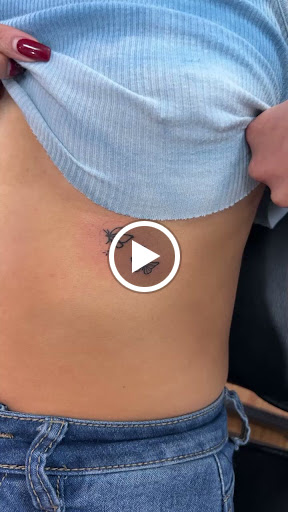 Explore name on neck tattoo ideas, creative tattoo ideas in West Babylon, available at Bizzy Empire Tattoo