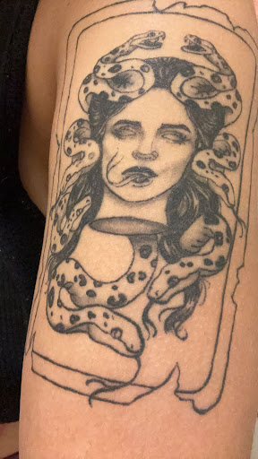 Explore sternum tattoo ideas for females, creative tattoo ideas in Ocoee, available at Fine Ink Studios Tattoos