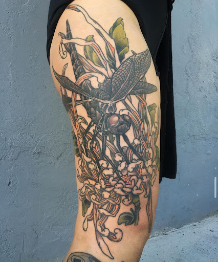 Explore dog outline tattoo ideas, creative tattoo ideas in Stevens Point, available at Black Rabbit Tattooing