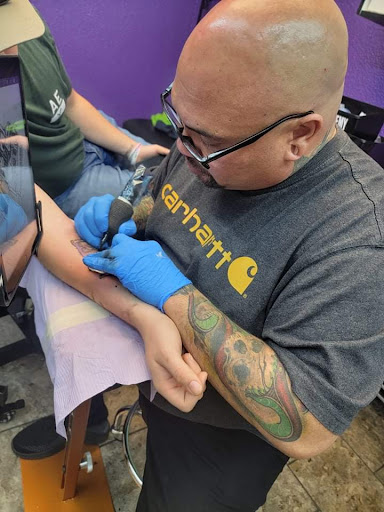 Explore women arm tattoo ideas, creative tattoo ideas in Fort Wayne, available at Grade A Tattoos and Body Piercing