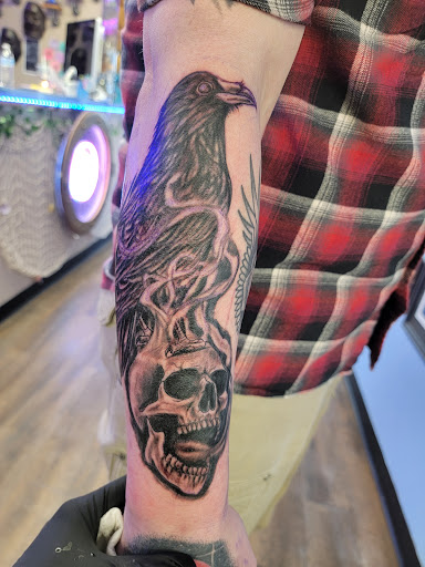 Explore tattoo ideas for hand, creative tattoo ideas in Forest Lake, available at Electric Blue Tattoo Co.