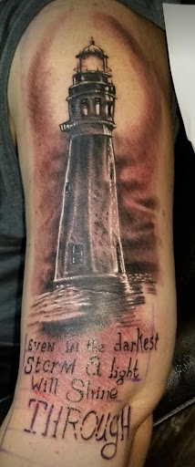 Explore stretch mark tattoo ideas, creative tattoo ideas in Angola, available at Hoodlum Ink