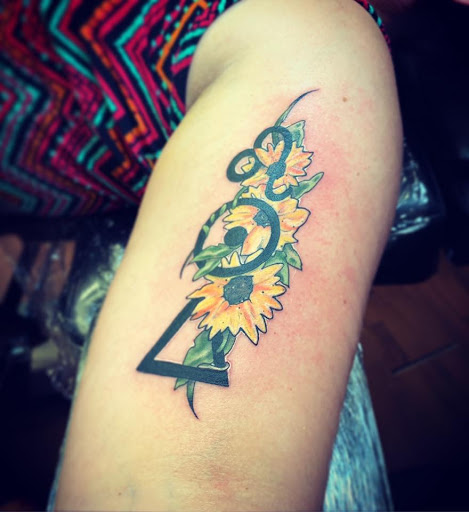 Explore tattoo flower sleeve ideas, creative tattoo ideas in Williamsport, available at Moa Tattoos