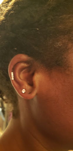 Explore safety pin tattoo ideas, creative tattoo ideas in Cambridge, available at Luckys Tattoo and Piercing