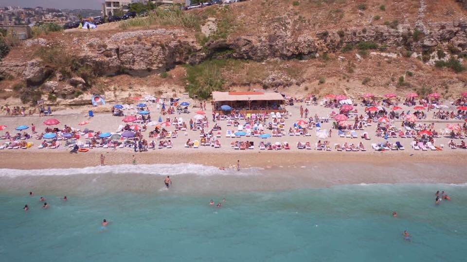 Photo of Bahsa Beach and the settlement